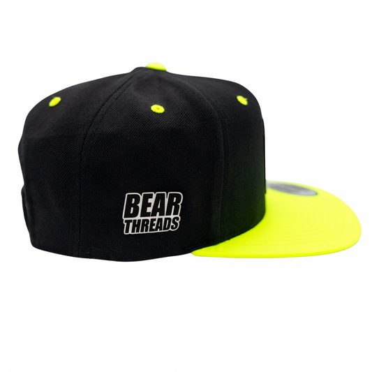 Black and yellow cap with 'Bear Threads' logo on a white background